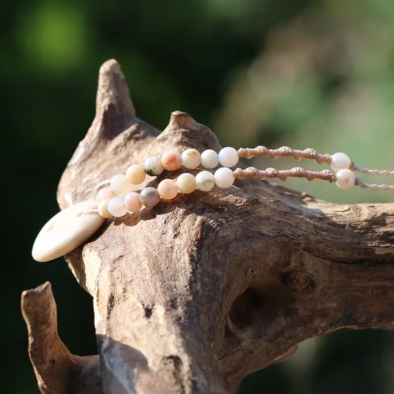 Schmuck aus Kieselsteinen / Strandsteinen - Halskette mit Amazonit und gebohrtem Herz