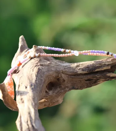 Schmuck / Halskette mit Muschel / Kegelschnecke, Seeglas / Strandglas und Kokos- und Ethno-Perlen in Orange - Flieder