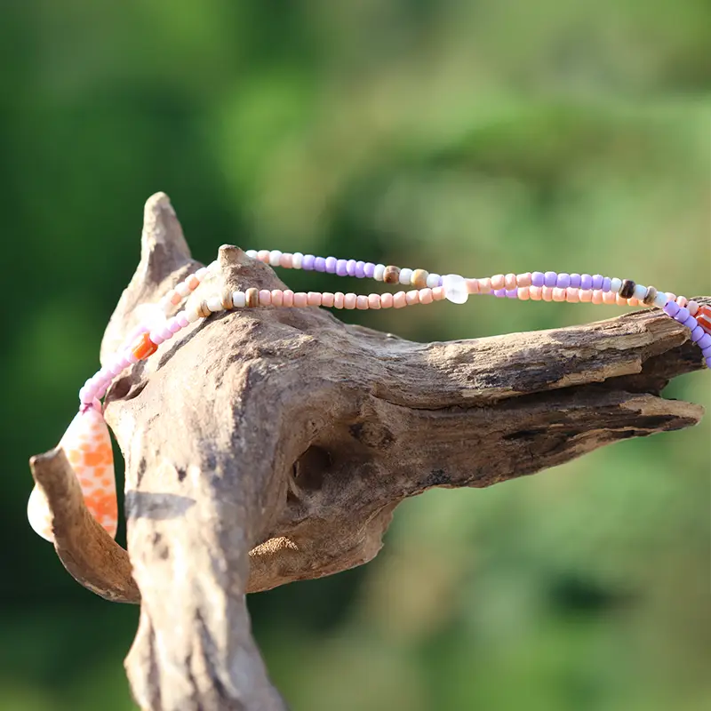 Schmuck / Halskette mit Muschel / Kegelschnecke, Seeglas / Strandglas und Kokos- und Ethno-Perlen in Orange - Flieder